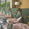 Unicorn Tipi Slaapfeestje met pastelkleuren, lichtjes en glitters in droomstijl